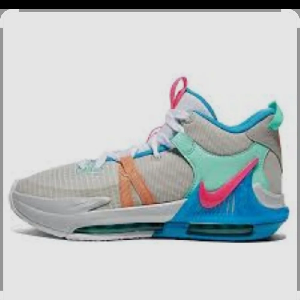 Nike Lebron Sneakers in White, Pink, and Blue